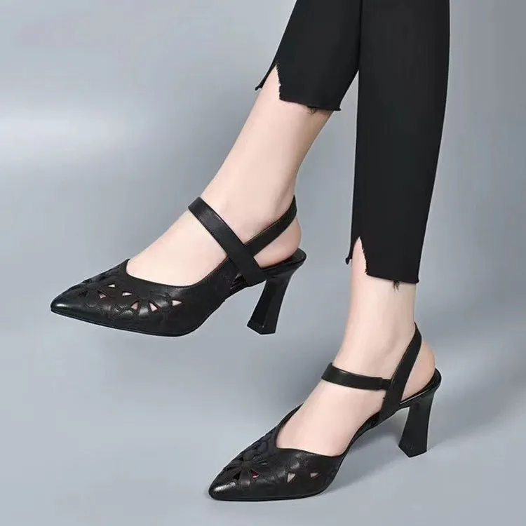Women's pointed toe sandals with hollowed toe box in black, red, and creamy-white on a rubber sole.