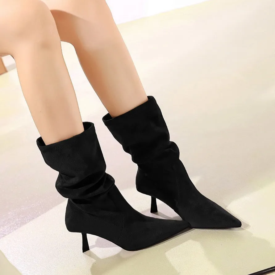 Mid-calf pointed toe stiletto heel boots in dark brown with elastic pleated pile style and sewing line detail.