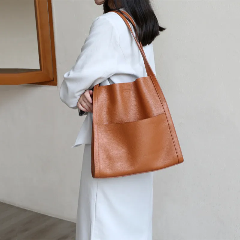 Genuine leather square vertical shoulder bag in black, soft first layer cowhide with sewing thread detail and three-dimensional outer pocket