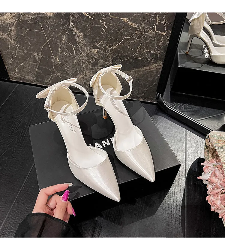 Satin white wedding shoes plus size with ankle buckle closure and 7cm heel on white background