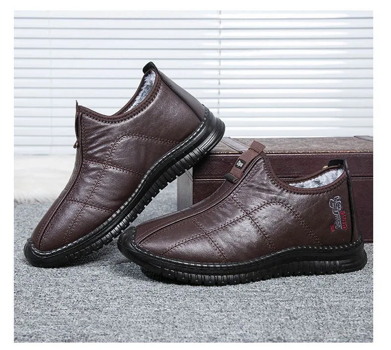 Men's brown winter cotton boots with a buckle closure and a thick, treaded non-slip sole.