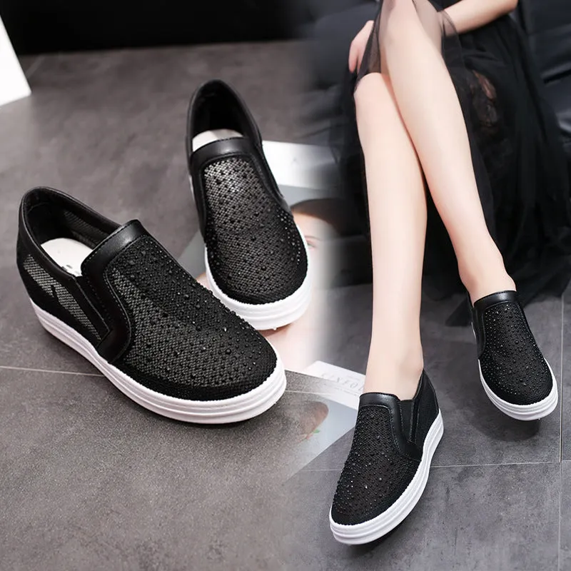 Women's wedge slip-on shoes in black with mesh upper and round toe