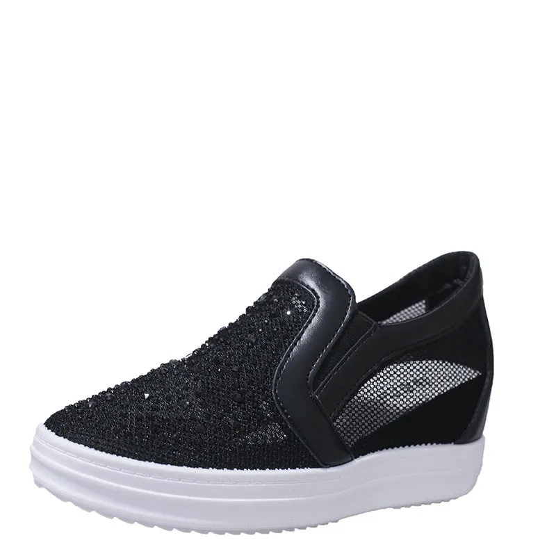 Women's wedge slip-on shoes in black with mesh upper and round toe