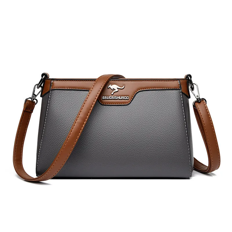 One shoulder soft PU small square stitching women's cross-body bag in black with contrast colour details and double strap