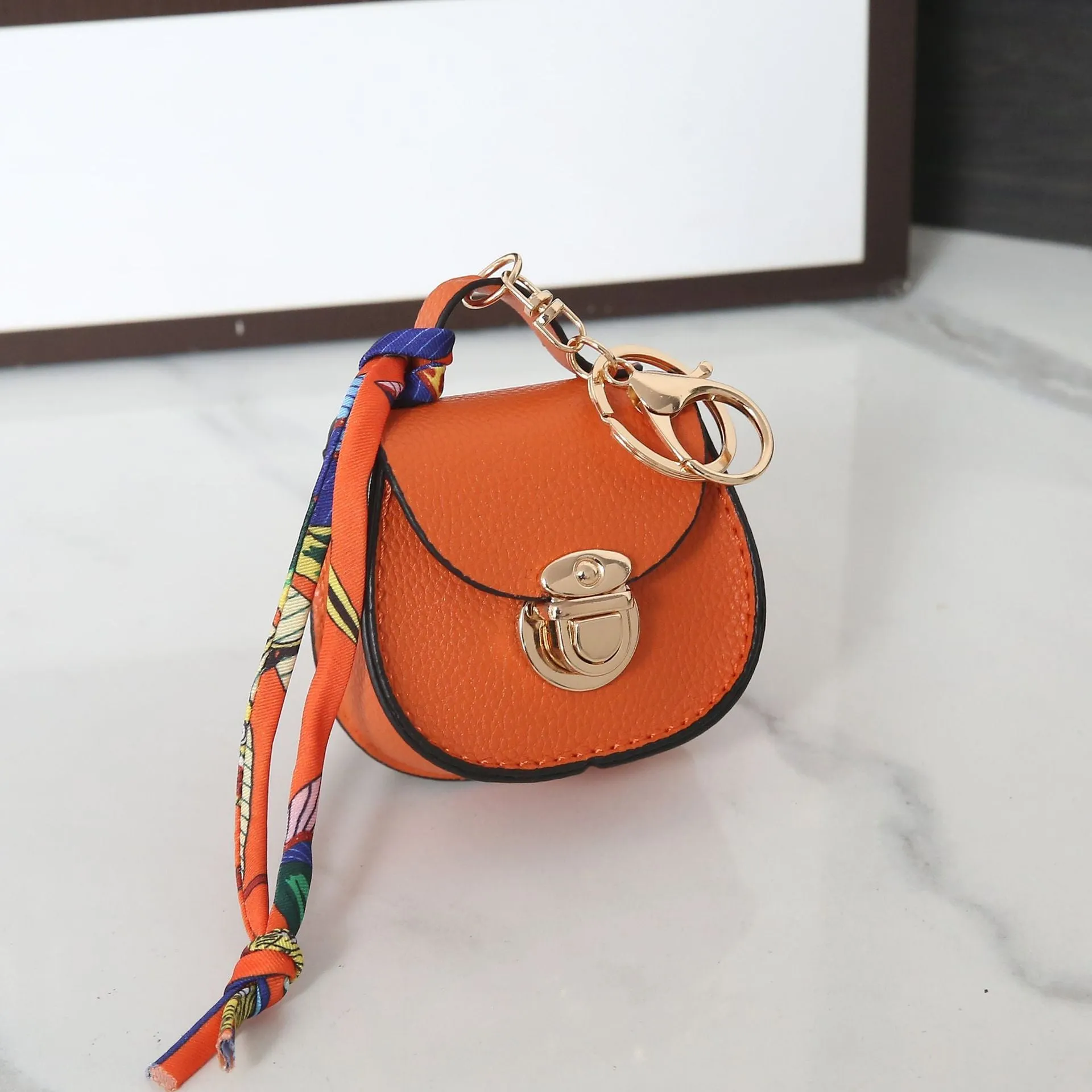 Solid colour PVC coin purse with keychain attachment in multiple colour options