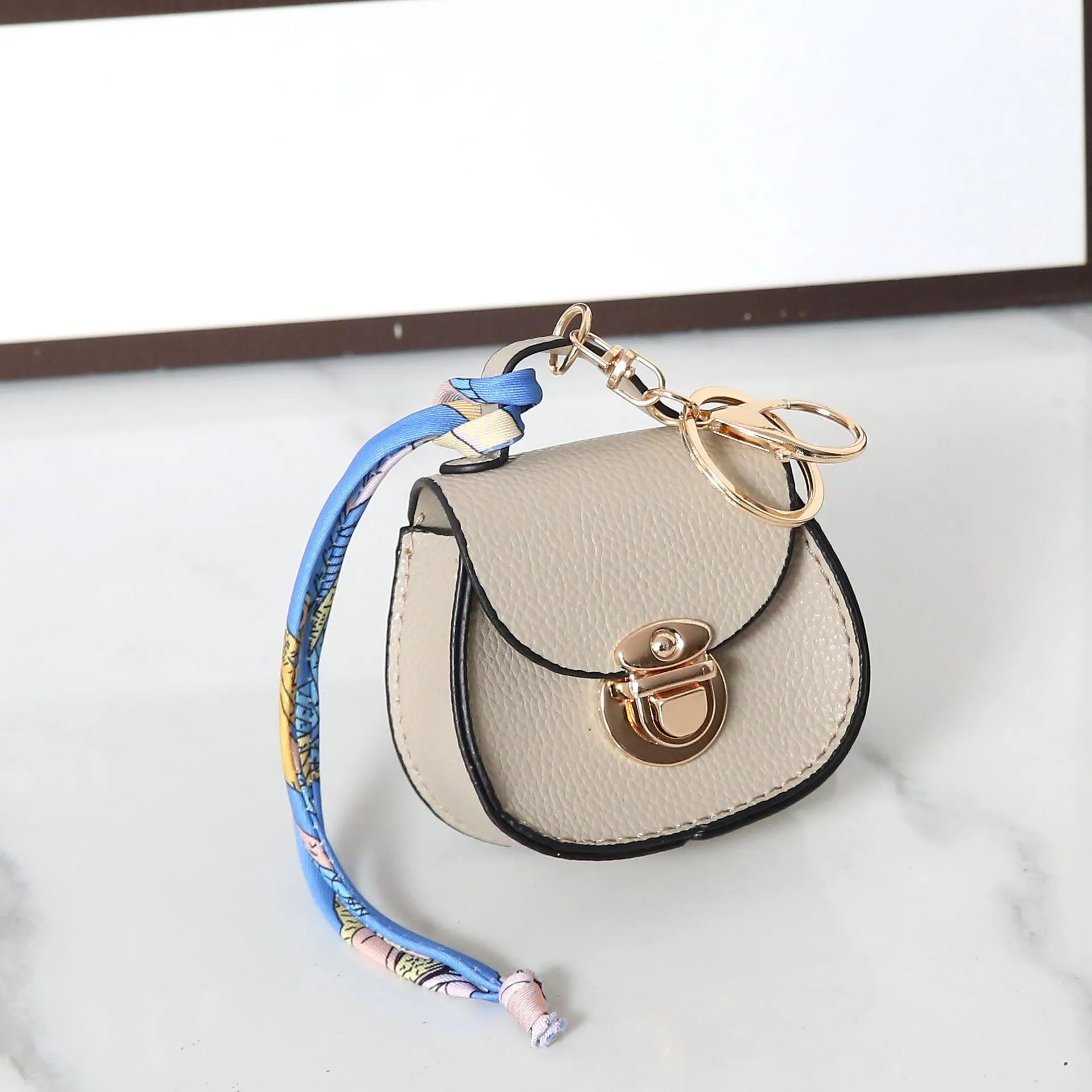 Solid colour PVC coin purse with keychain attachment in multiple colour options