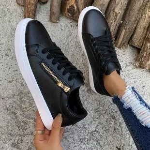 Women's casual sports shoes with side zipper, artificial PU upper, and rubber sole in black