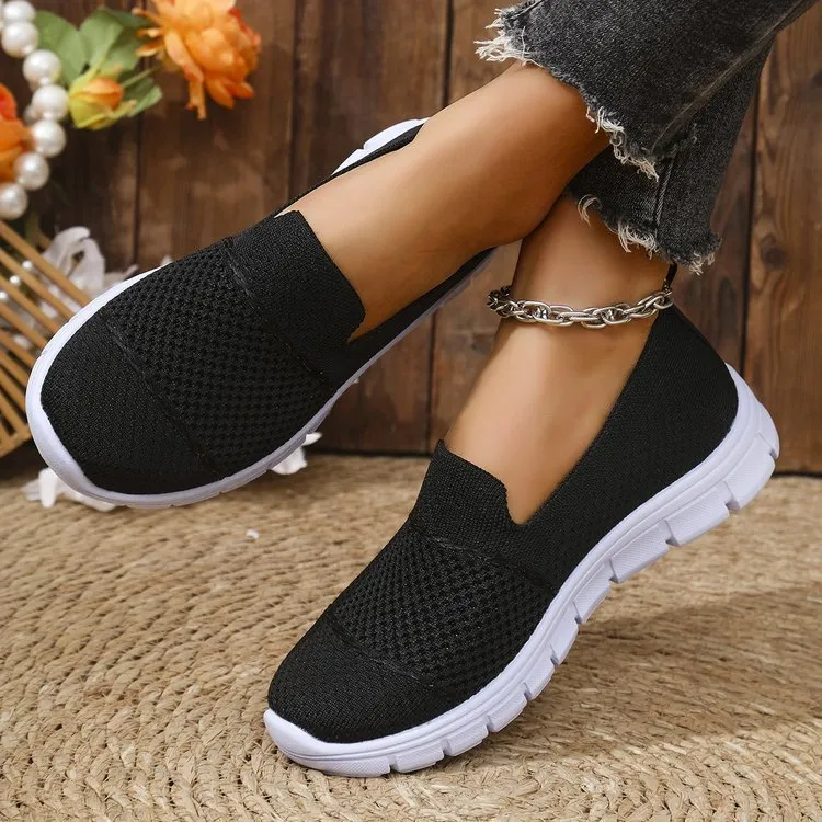 Women's mesh breathable flat casual shoes in solid colour with round toe and PVC sole