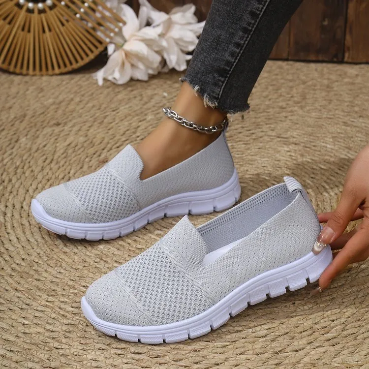 Women's mesh breathable flat casual shoes in solid colour with round toe and PVC sole