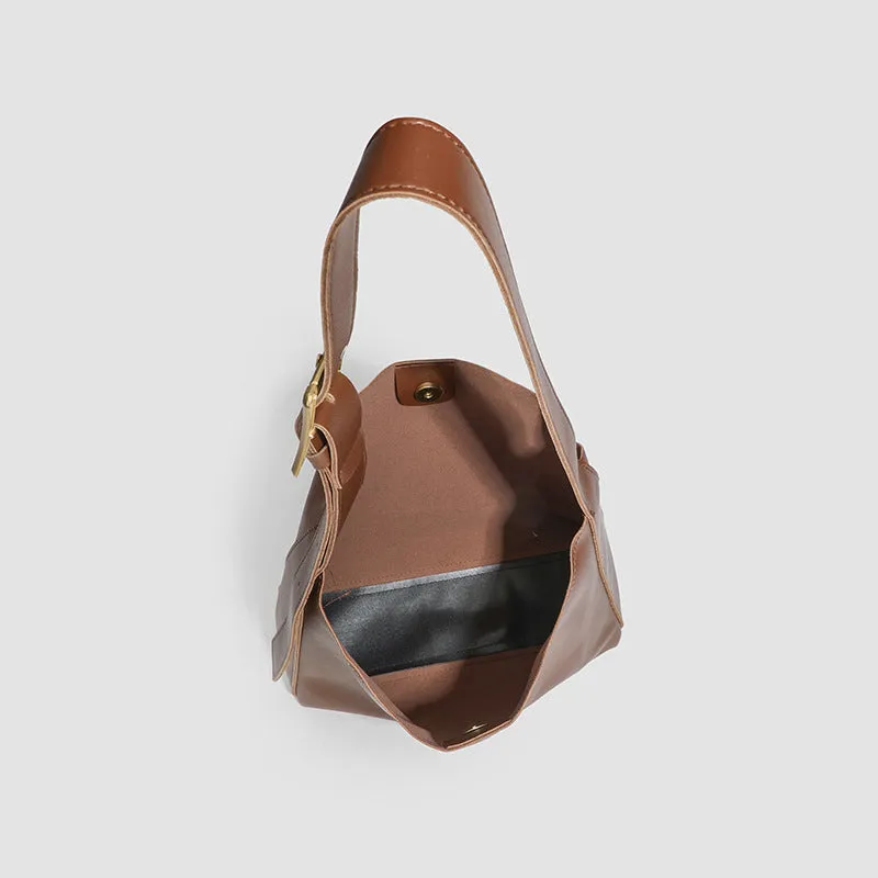 Retro textured Maillard tote bag in brown PU with visible sewing thread detailing and three-dimensional outer pocket