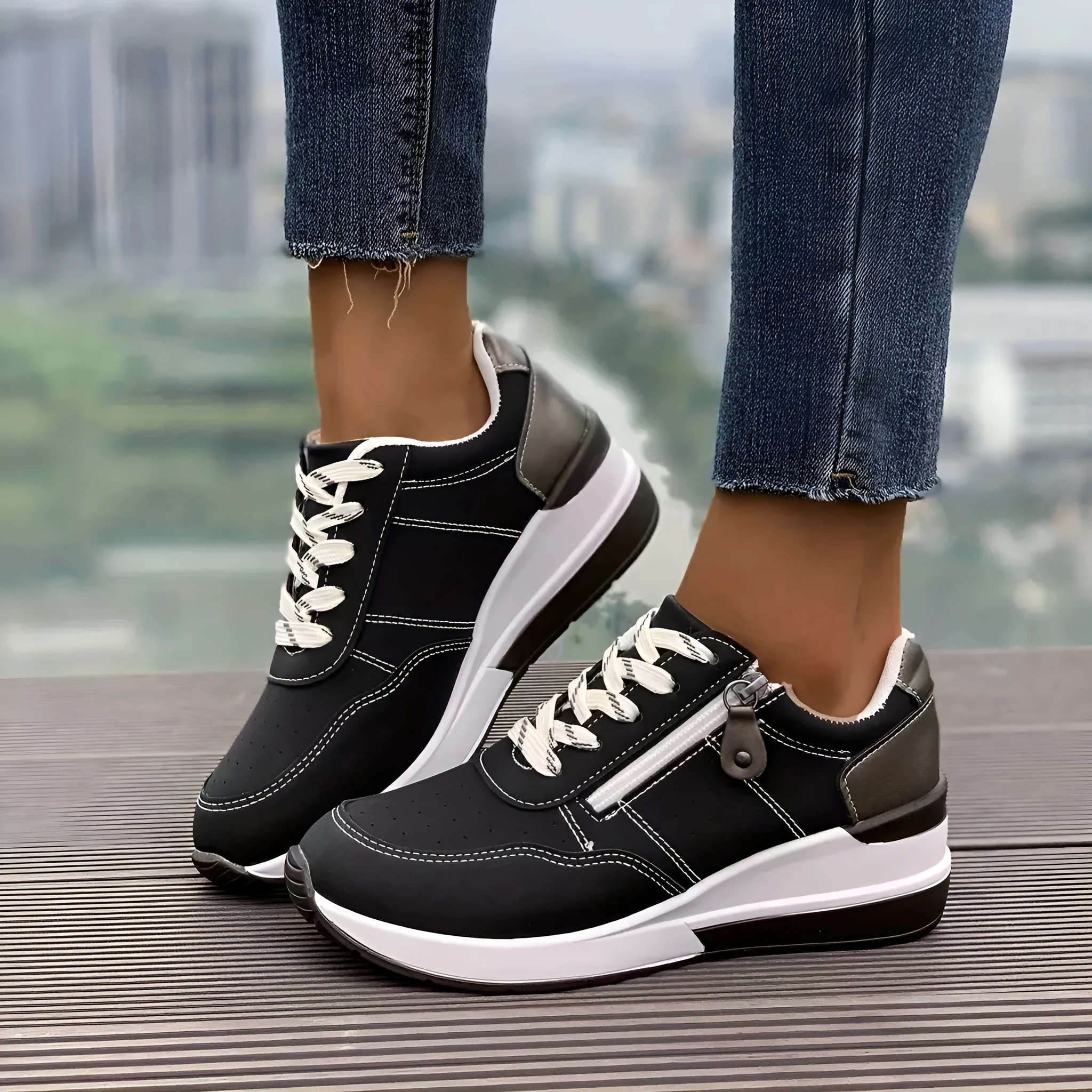 Women's casual sneakers with thick EVA outsole and synthetic leather upper in black, side view