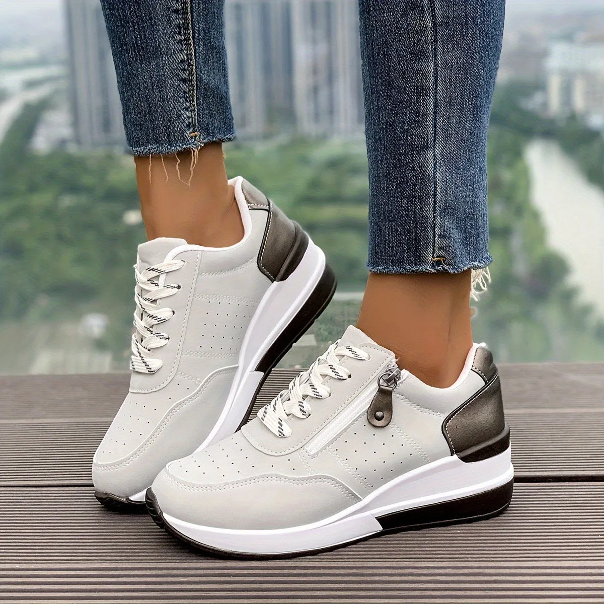 Women's casual sneakers with thick EVA outsole and synthetic leather upper in black, side view