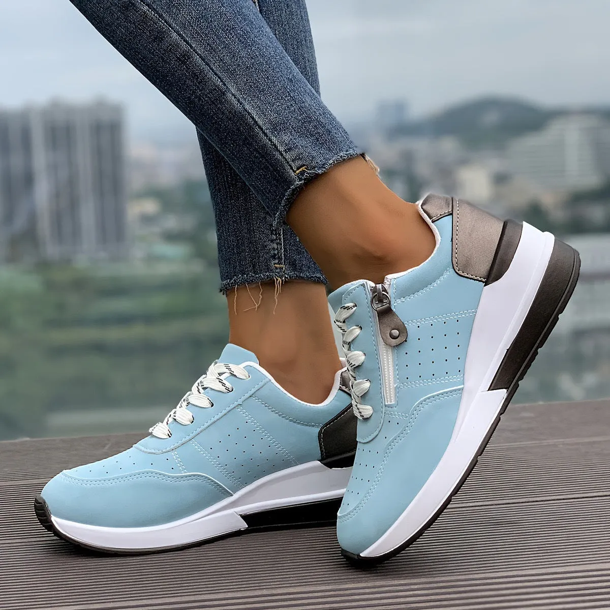 Women's casual sneakers with thick EVA outsole and synthetic leather upper in black, side view