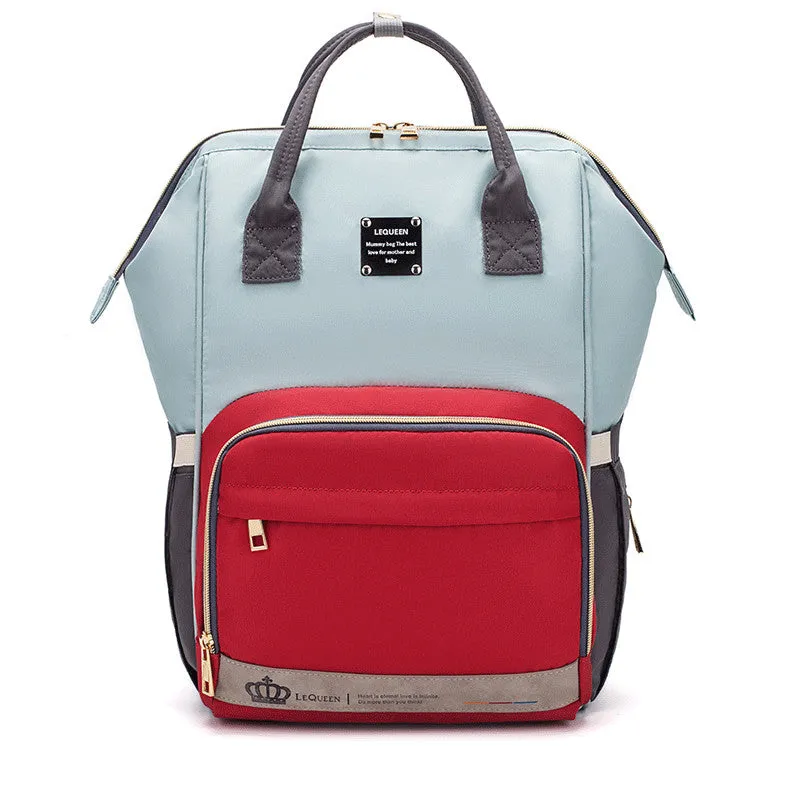 Mummy maternity bag backpack in solid colour with zipper closure and nylon finish