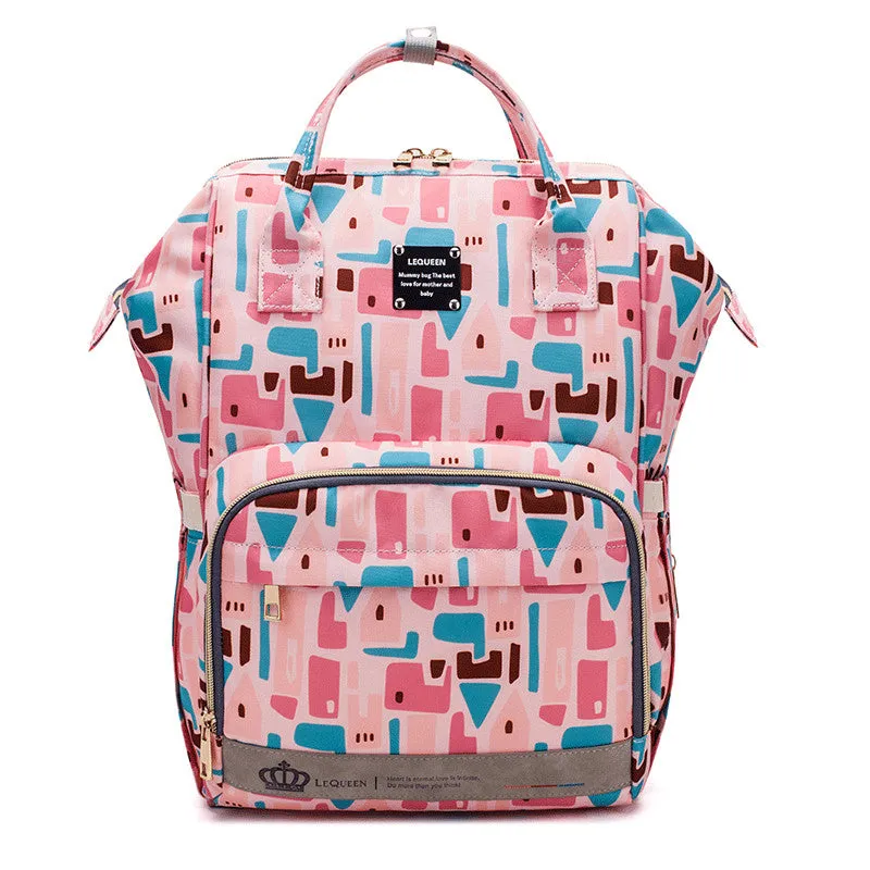 Mummy maternity bag backpack in solid colour with zipper closure and nylon finish