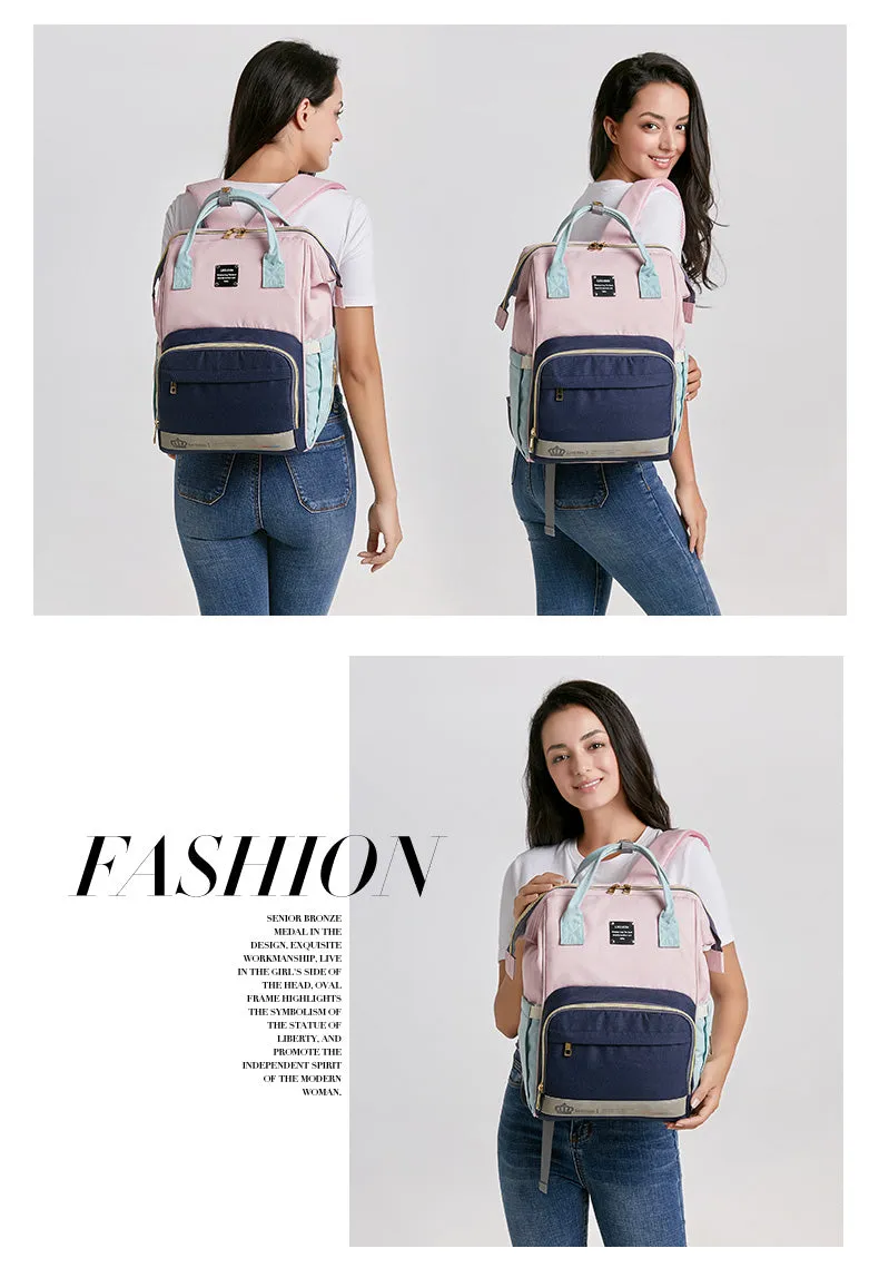 Mummy maternity bag backpack in solid colour with zipper closure and nylon finish