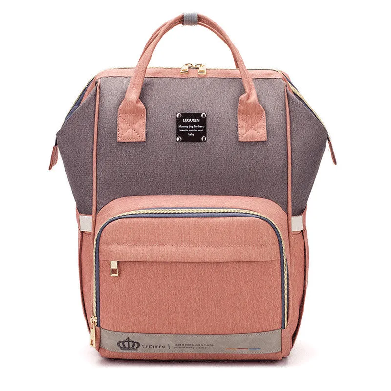 Mummy maternity bag backpack in solid colour with zipper closure and nylon finish