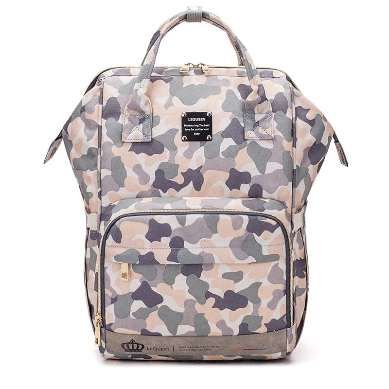 Mummy maternity bag backpack in solid colour with zipper closure and nylon finish