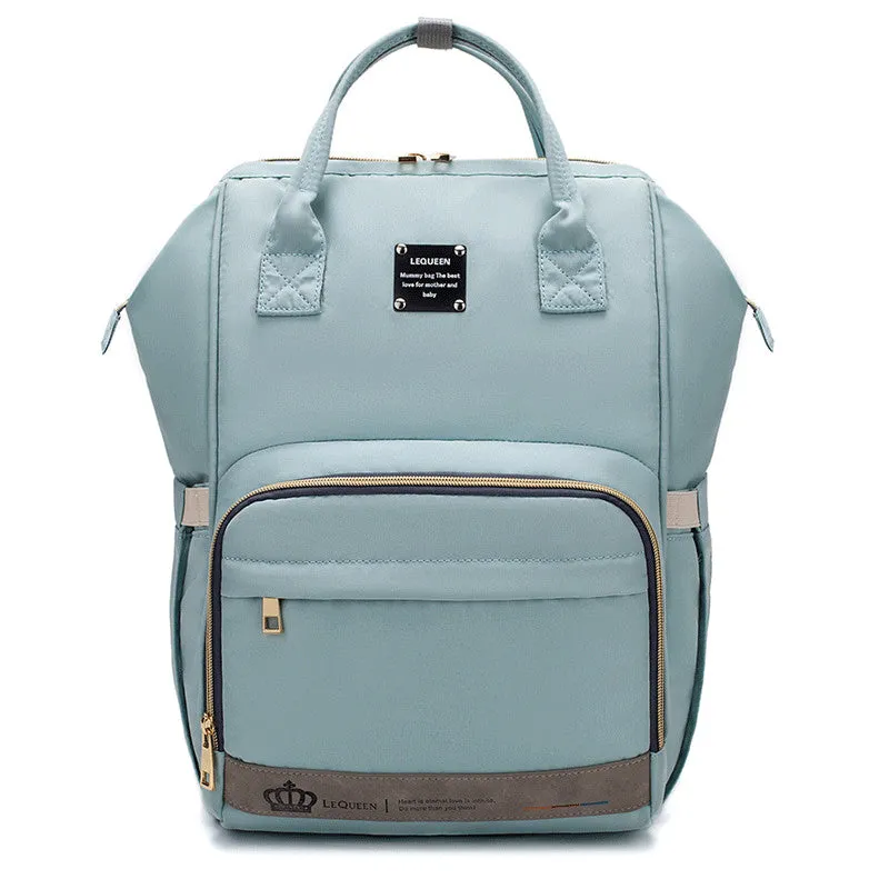 Mummy maternity bag backpack in solid colour with zipper closure and nylon finish