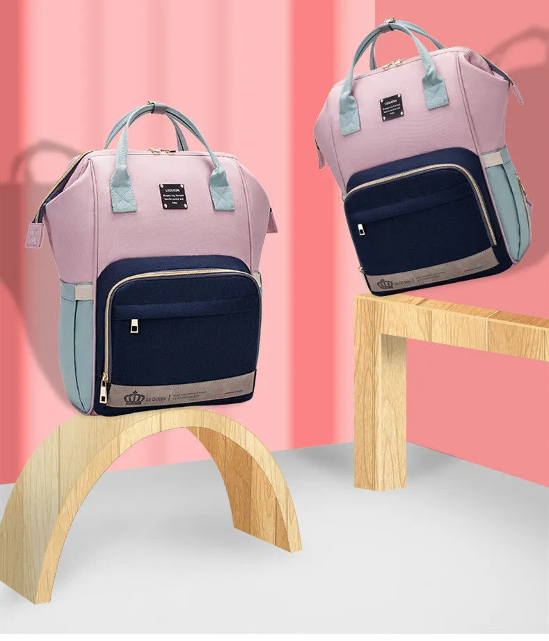 Mummy maternity bag backpack in solid colour with zipper closure and nylon finish