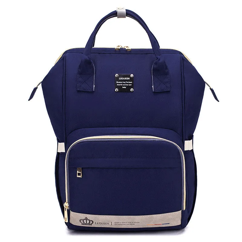 Mummy maternity bag backpack in solid colour with zipper closure and nylon finish