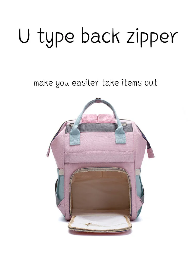 Mummy maternity bag backpack in solid colour with zipper closure and nylon finish