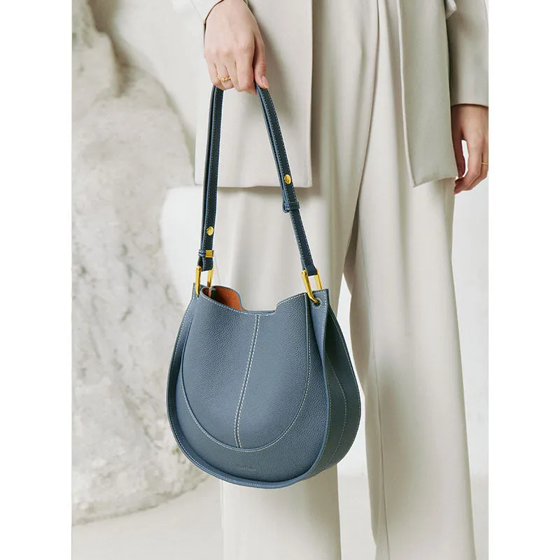Designer small crossbody bag for women in genuine top grain leather with retro splicing detail