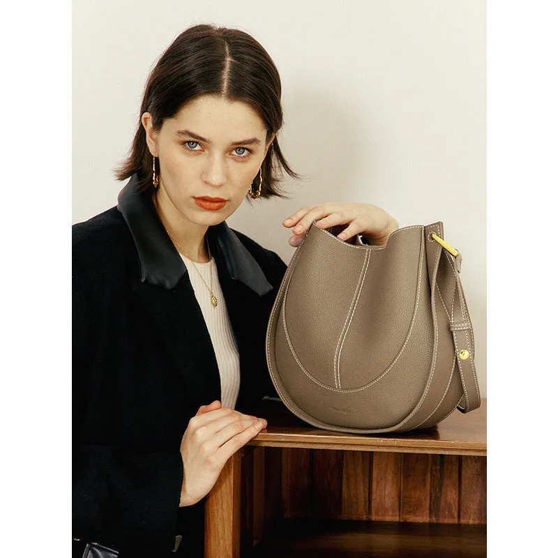 Designer small crossbody bag for women in genuine top grain leather with retro splicing detail