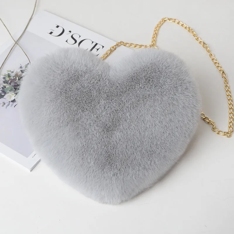 Love Bags plush heart-shaped shoulder bag in red, with chain strap and zipper, 25cm wide