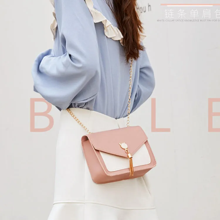 Small square PU leather crossbody bag with cat tassel decoration, magnetic flap, and adjustable chain strap in black