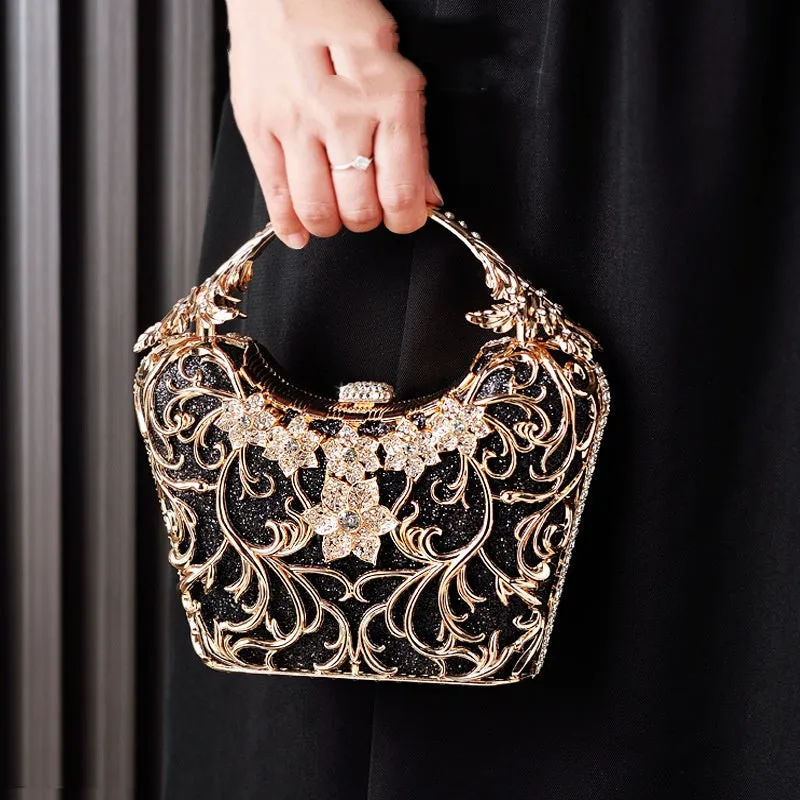 Silver hollow-out party clutch with shiny finish, flower motif, and bucket shape on a plain background