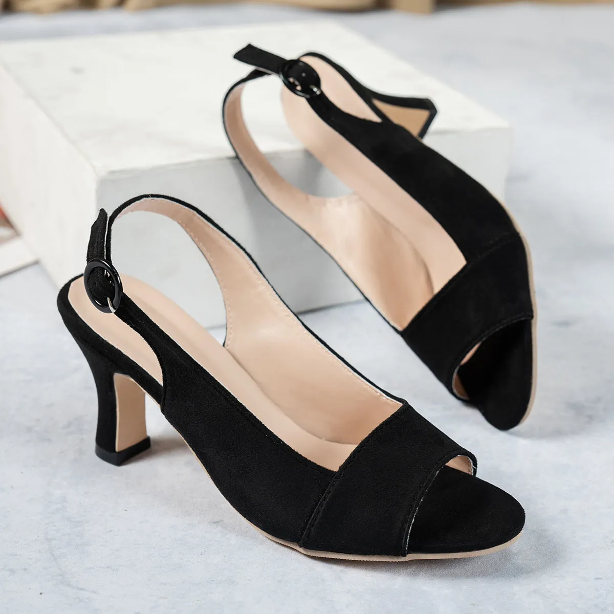 Women's pointed toe stiletto high heel shoes in black suede with buckle fastening
