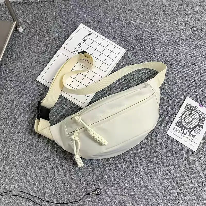 Men's black polyester chest bag shown as a crossbody bag with 35cm width