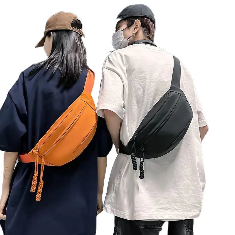 Men's black polyester chest bag shown as a crossbody bag with 35cm width