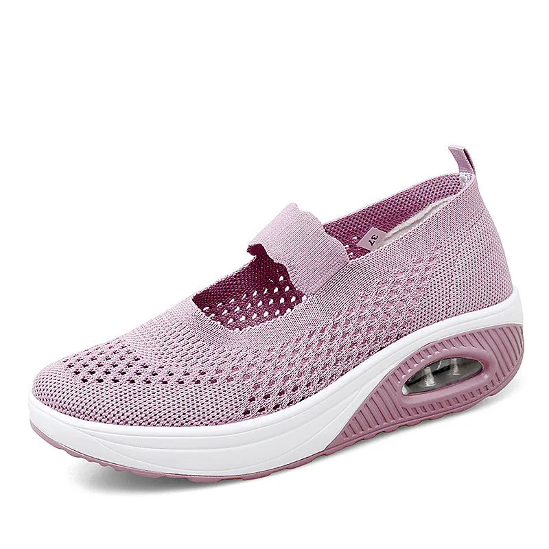 Women's beige slip-on mesh shoes with round toe and low heel on a white background