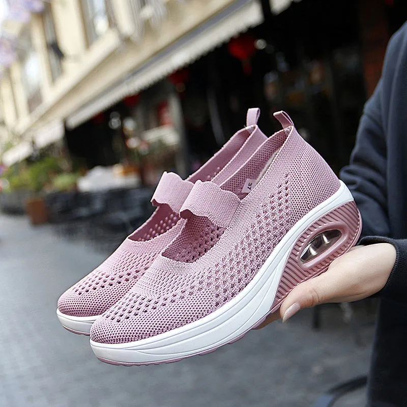 Women's beige slip-on mesh shoes with round toe and low heel on a white background