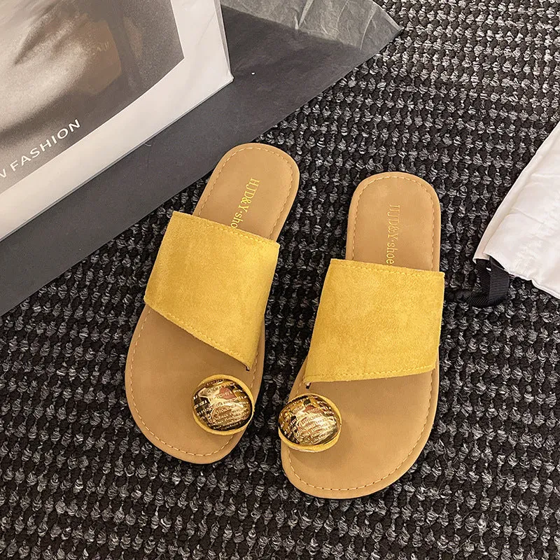 Women's flat bottomed French toe flip flops in solid colours on a light background