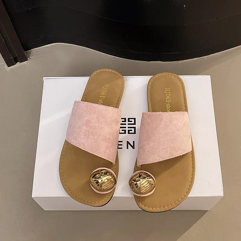 Women's flat bottomed French toe flip flops in solid colours on a light background