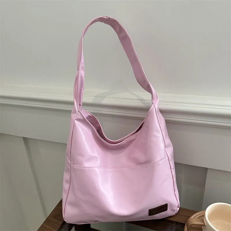 Women's retro large capacity PU bucket tote bag in Korean style with sewing thread detail, shown in coffee colour