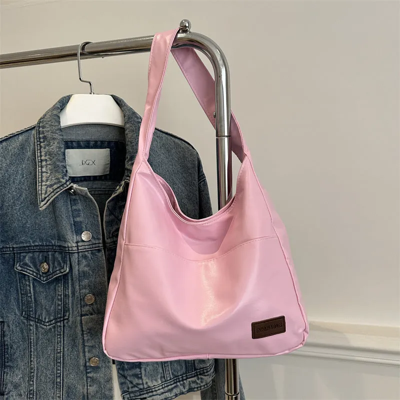 Women's retro large capacity PU bucket tote bag in Korean style with sewing thread detail, shown in coffee colour