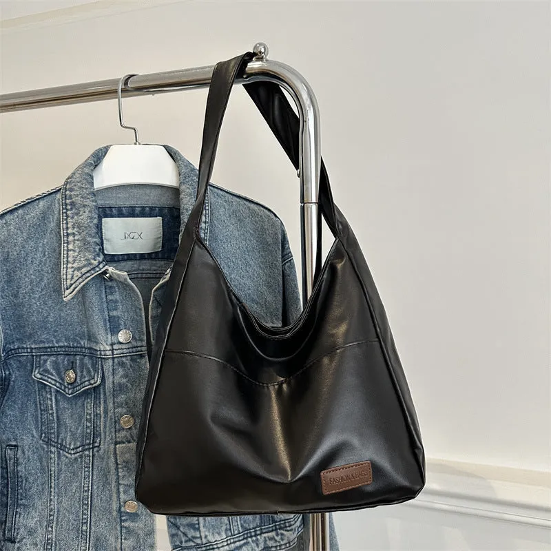 Women's retro large capacity PU bucket tote bag in Korean style with sewing thread detail, shown in coffee colour