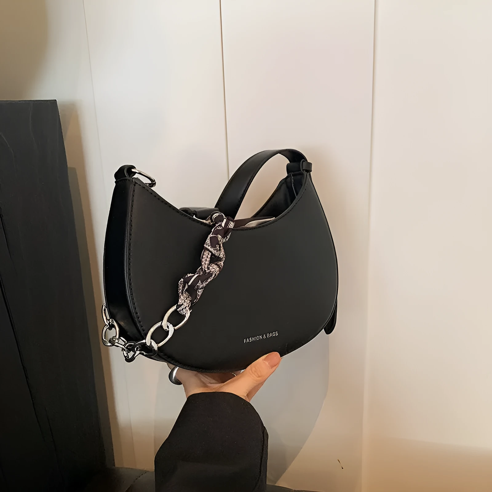 Small PU leather saddle bag on a flat surface, available in black, brown, coffee, green, khaki, and white