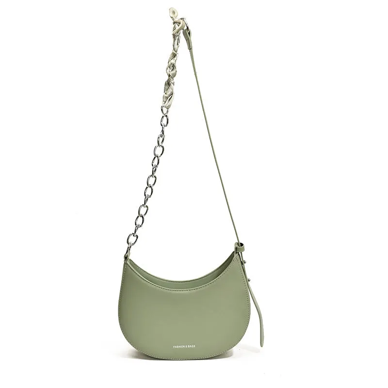 Small PU leather saddle bag on a flat surface, available in black, brown, coffee, green, khaki, and white