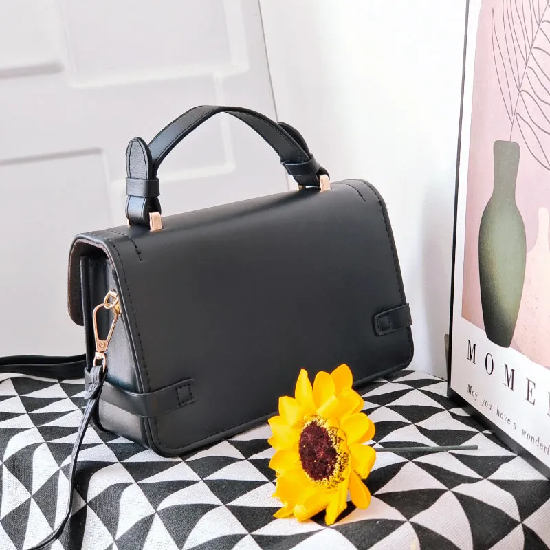 Retro small square pattern crossbody bag in apricot colour, showing horizontal square shape and stitching detail.