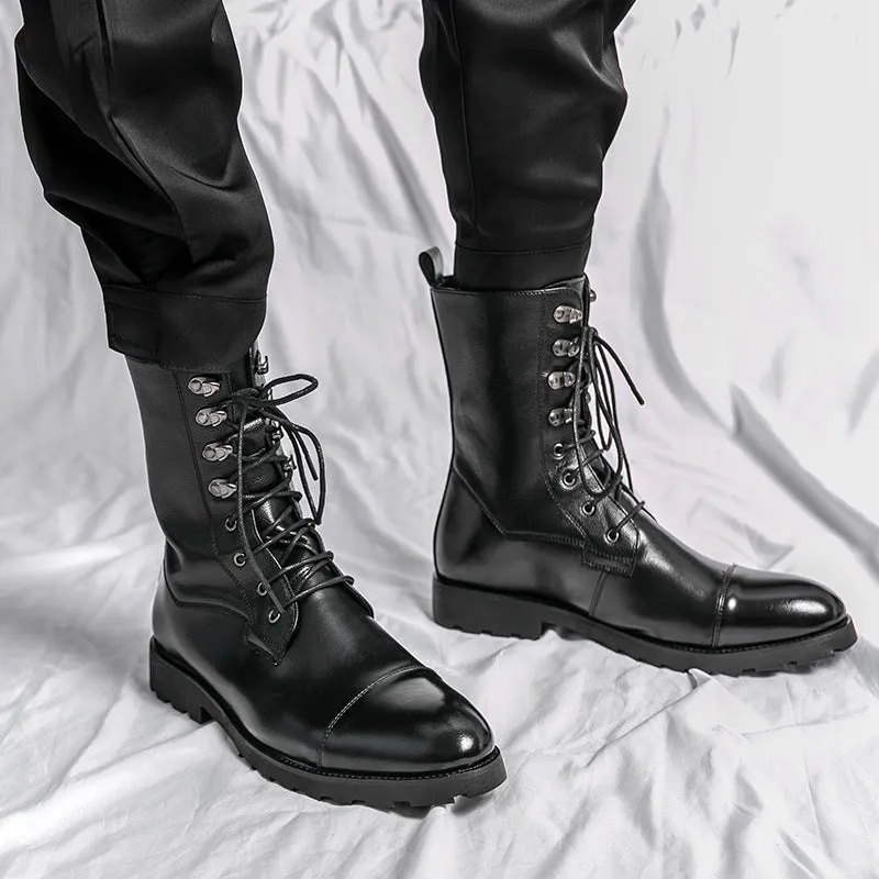 Black denim lace-up booties with lace closure and low heel on a white background