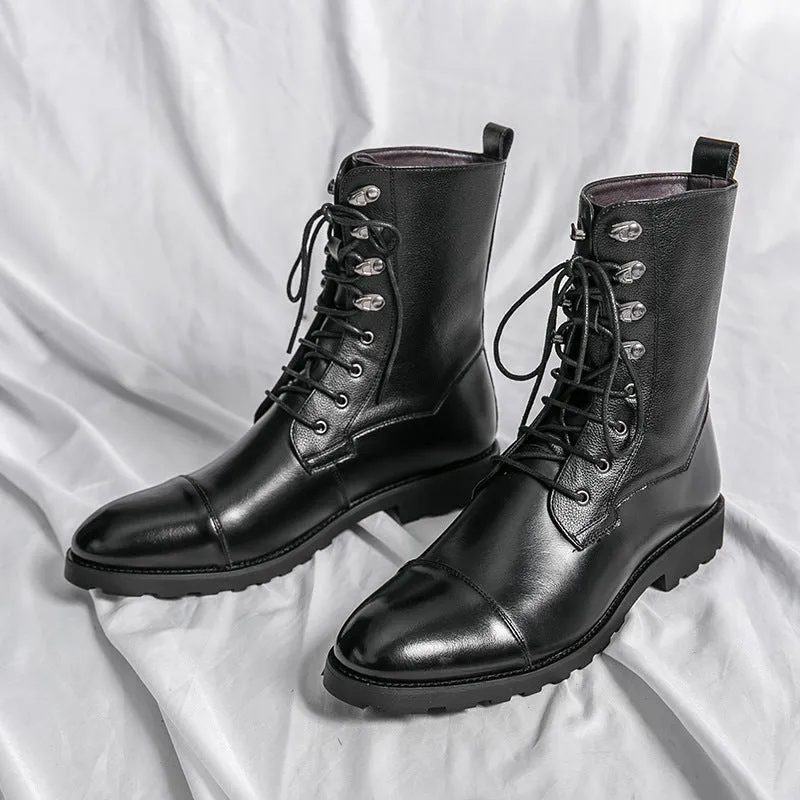 Black denim lace-up booties with lace closure and low heel on a white background