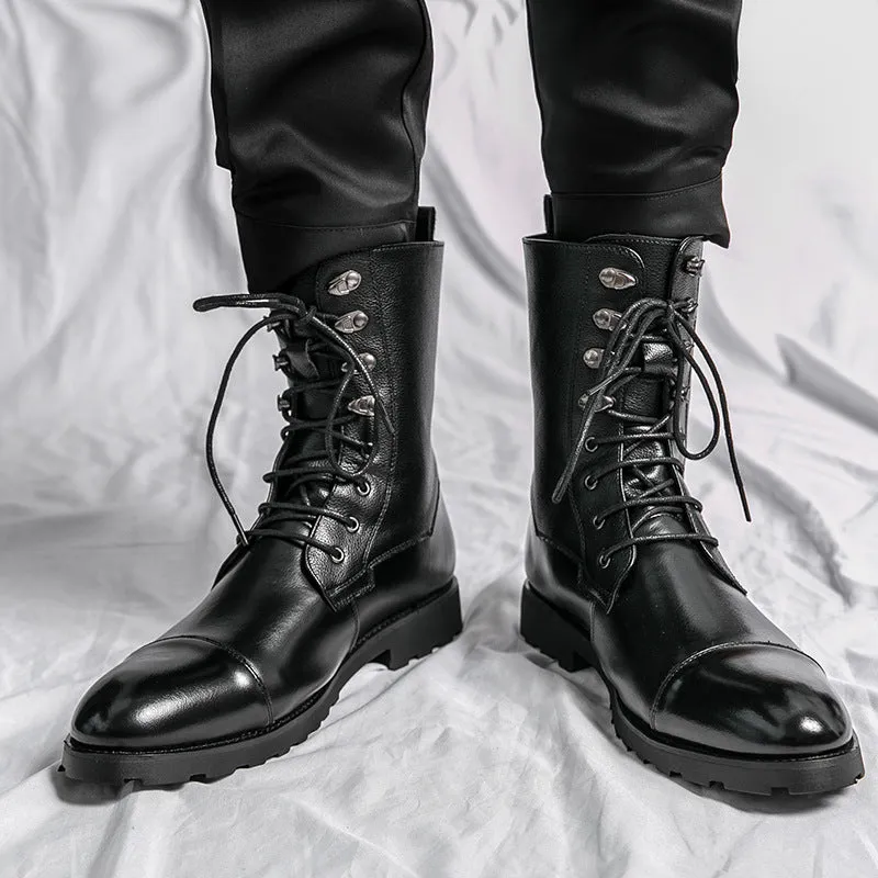 Black denim lace-up booties with lace closure and low heel on a white background