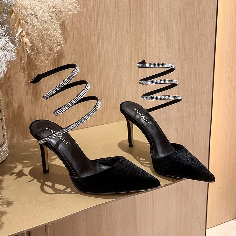 Women's pointed stiletto heel high heels in black velvet with ankle strap cross tie closure