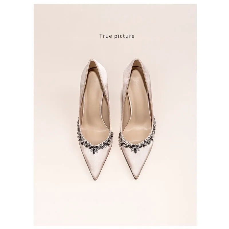 Women's black satin stiletto heels with rhinestone decoration and pointed toe
