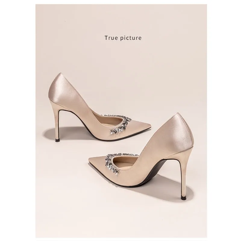 Women's black satin stiletto heels with rhinestone decoration and pointed toe